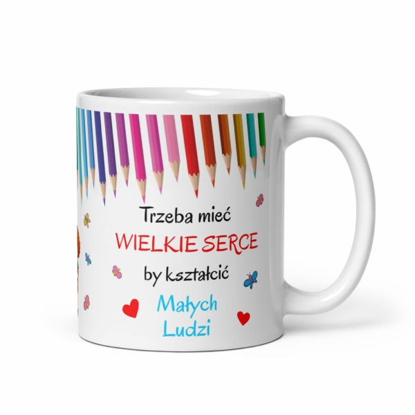 Kubek na Dzień Nauczyciela z kredkami i inspirujący napis Megaprezencik