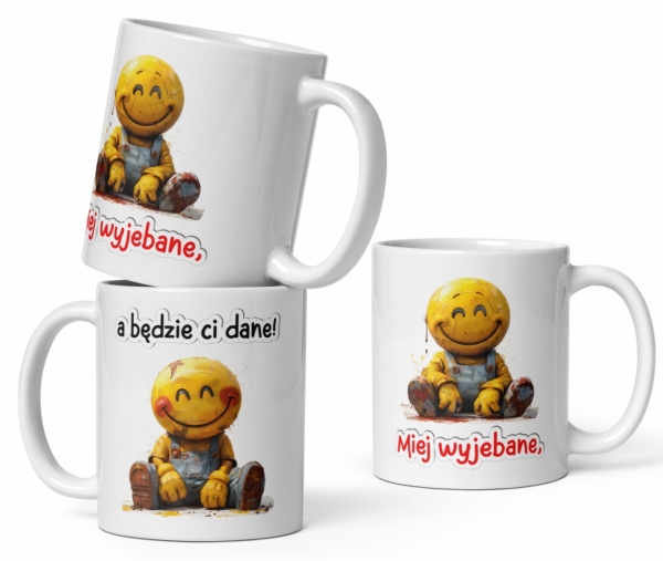 Śmieszny Kubek z uśmiechniętą minką oraz z napisem Miej wyjebane, a będzie ci dane! Mega Prezencik